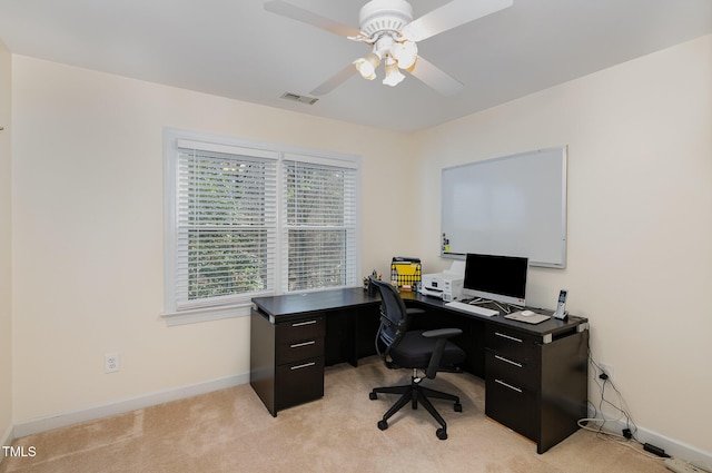 home office with light colored carpet and ceiling fan