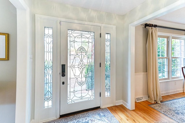 foyer with light wood-type flooring