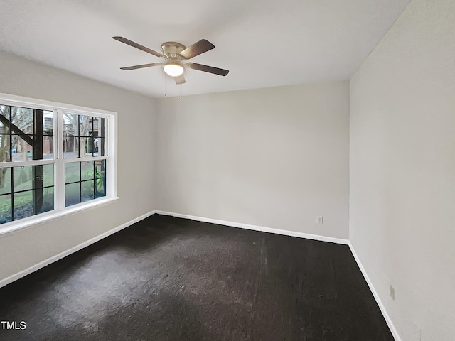 spare room featuring ceiling fan