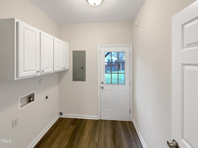 clothes washing area featuring cabinets, hookup for an electric dryer, electric panel, hookup for a washing machine, and dark hardwood / wood-style floors