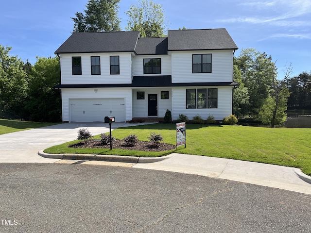 3204 Overlook Ct, Burlington, NC 27215 - view of front of house featuring a garage, a front lawn, and concrete driveway