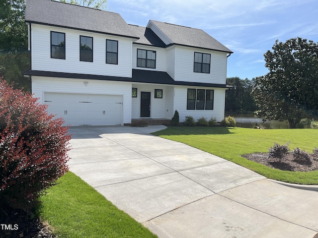 3204 Overlook Ct, Burlington, NC 27215 - modern inspired farmhouse with driveway, a garage, a front lawn, and roof with shingles