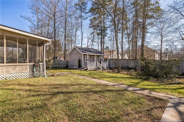 view of yard with a sunroom