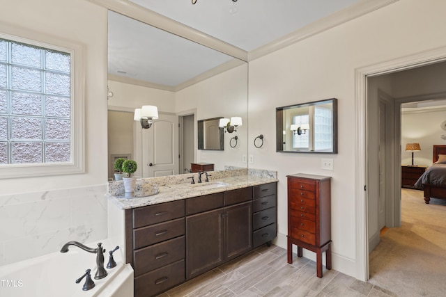 bathroom with vanity and a bath