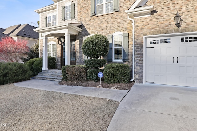 doorway to property featuring a garage