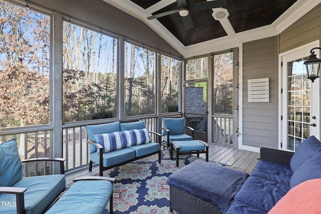 sunroom featuring coffered ceiling and ceiling fan