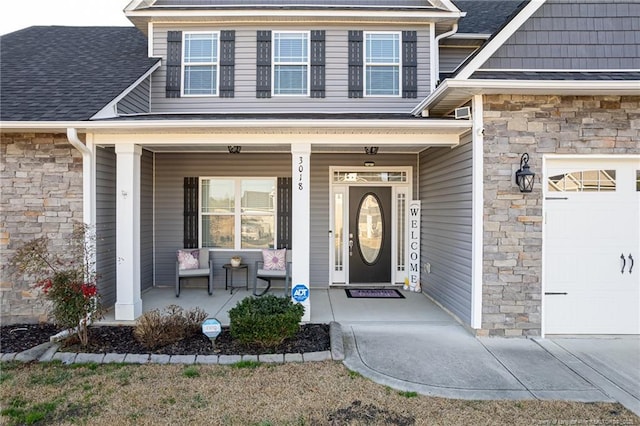 property entrance with a porch and a garage