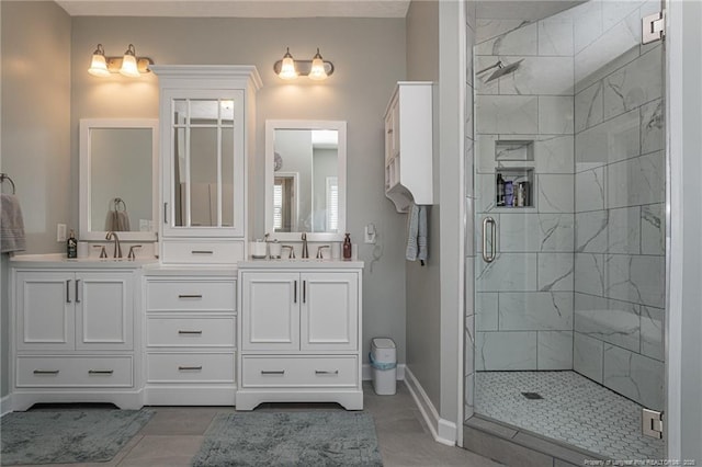 bathroom with vanity and an enclosed shower