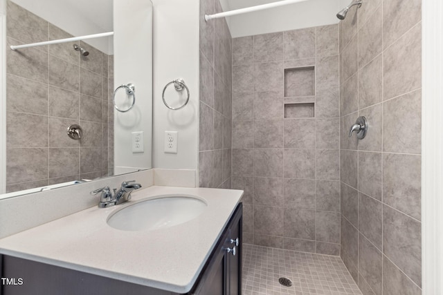 full bathroom featuring a shower stall and vanity