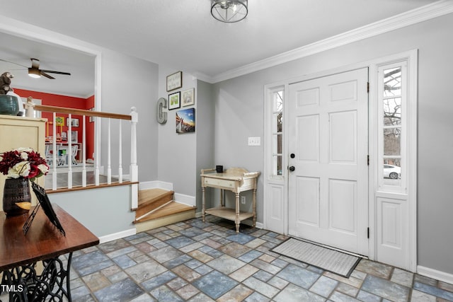 foyer featuring crown molding and ceiling fan