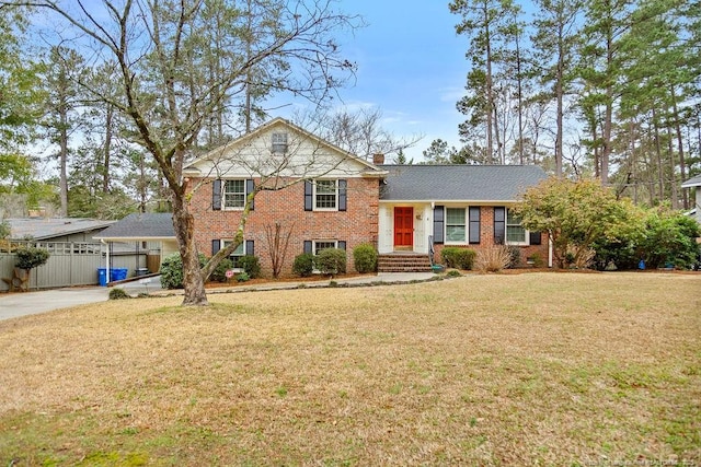 split level home with a front yard