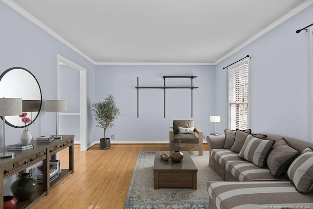 living room featuring wood-type flooring and ornamental molding