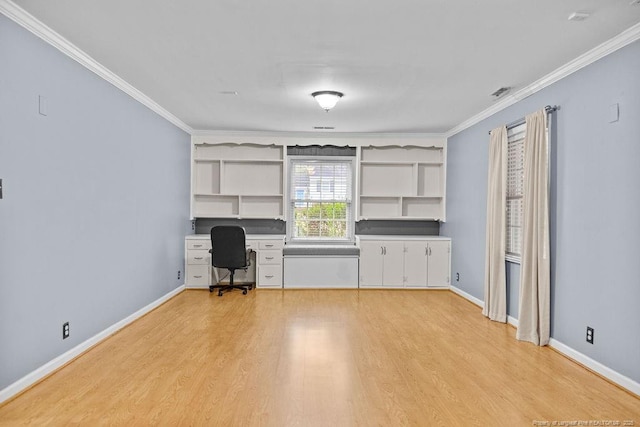 unfurnished office with ornamental molding and light hardwood / wood-style flooring