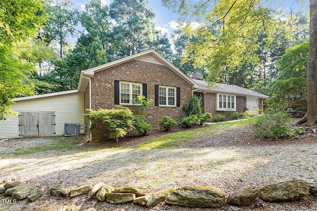 view of front of home with central AC unit