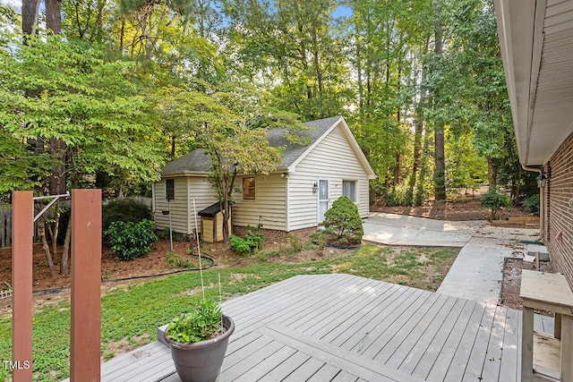 deck with an outbuilding