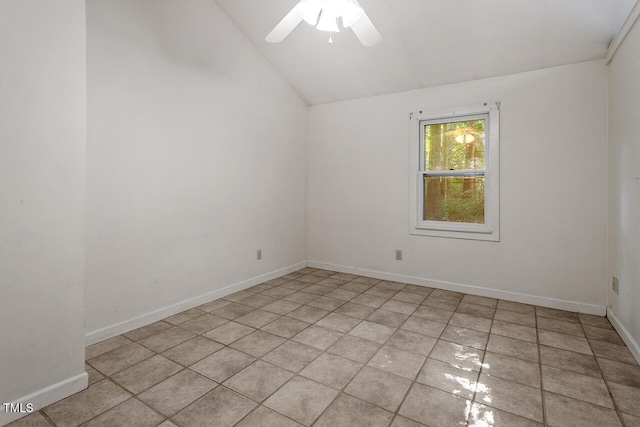 tiled spare room with ceiling fan and lofted ceiling