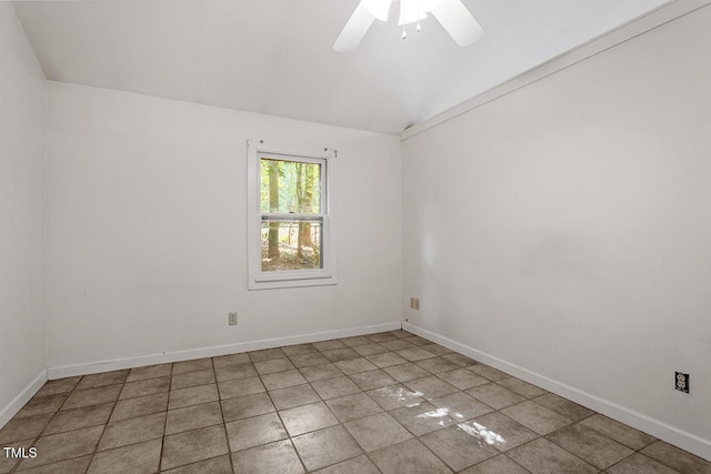 tiled spare room with lofted ceiling and ceiling fan