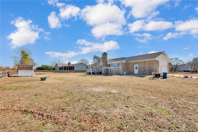 view of yard with a storage unit