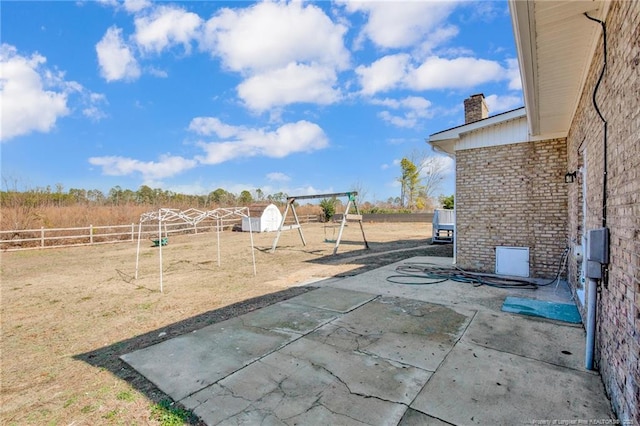 view of patio with a playground