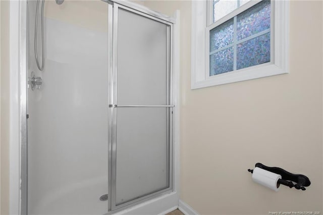 bathroom with an enclosed shower