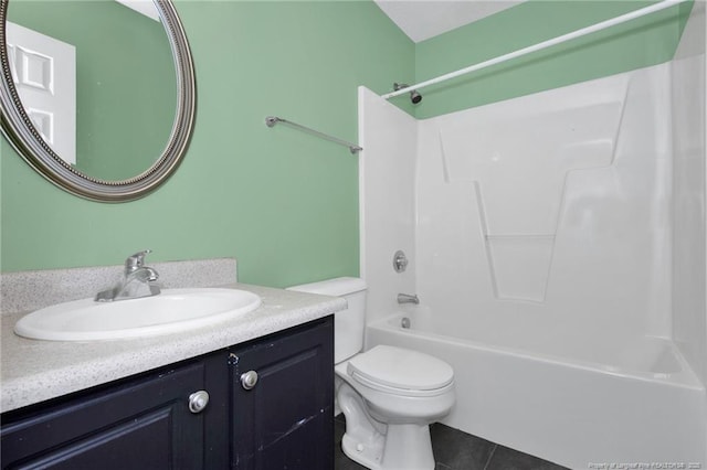 full bathroom with vanity, shower / washtub combination, tile patterned floors, and toilet