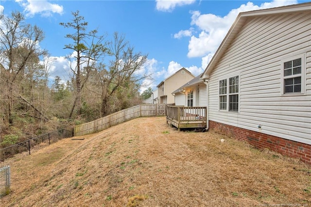 view of yard with a deck