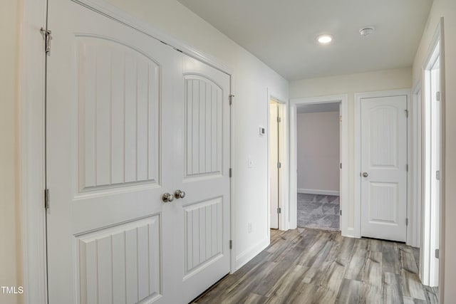 hallway featuring hardwood / wood-style floors