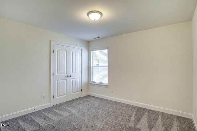 spare room with carpet flooring