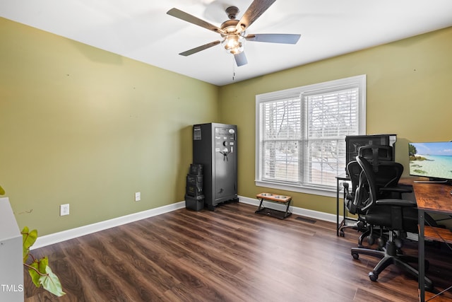 office with dark wood-style floors, ceiling fan, and baseboards