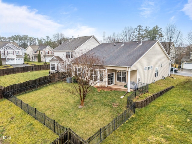 2815 Mebane Ln, Durham, NC 27703 - rear view of house featuring a patio, roof with shingles, and a residential view
