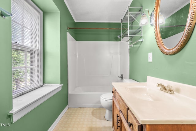 full bathroom featuring tile patterned floors, toilet, baseboards, vanity, and shower / tub combination