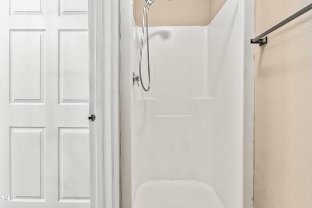 full bath featuring a shower