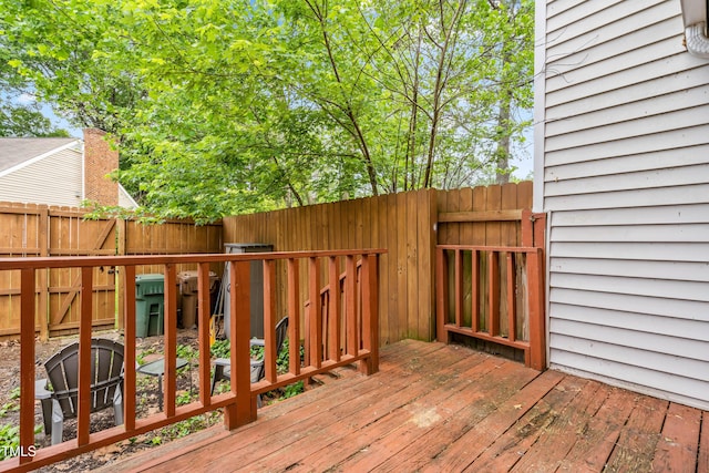 wooden deck featuring fence