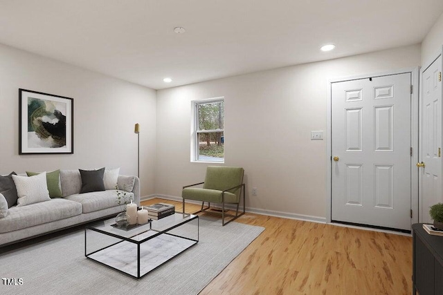 living room with light hardwood / wood-style floors