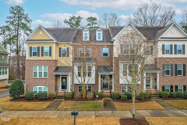 multi unit property featuring brick siding