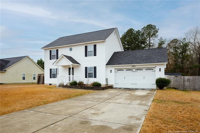 colonial-style house with a garage and a front lawn