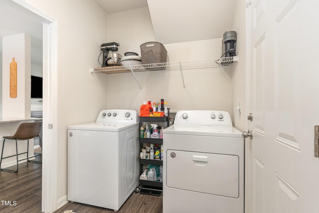 washroom with laundry area, dark wood-style floors, and washing machine and clothes dryer