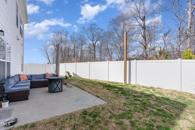 view of yard with outdoor lounge area, a patio area, and a fenced backyard