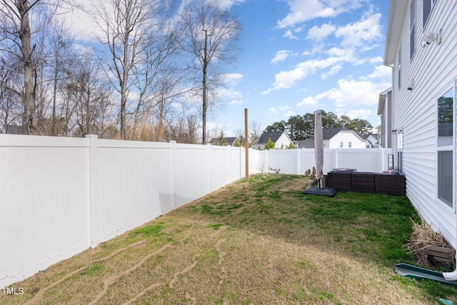 view of yard featuring an outdoor hangout area and a fenced backyard