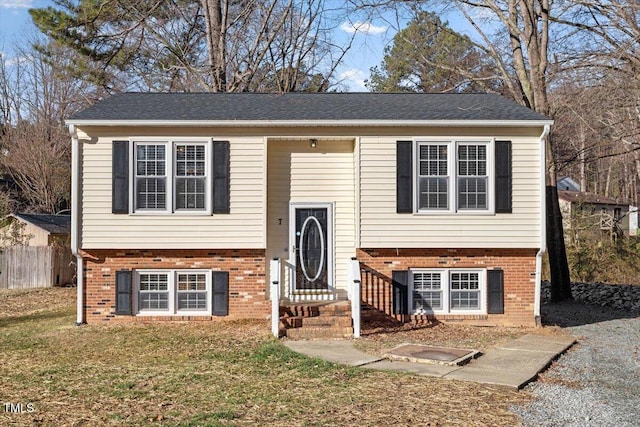 bi-level home with a front yard