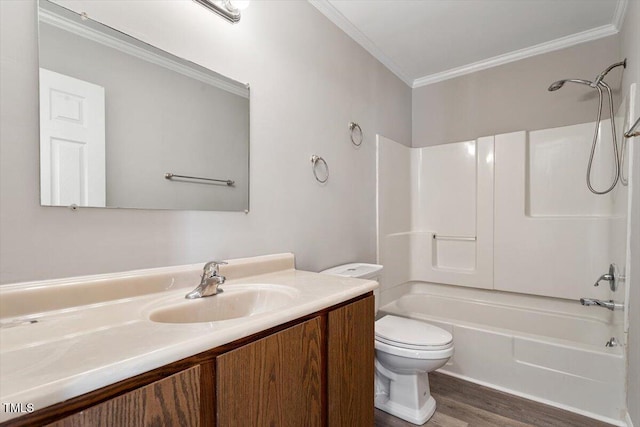 full bathroom featuring shower / bath combination, vanity, wood-type flooring, ornamental molding, and toilet