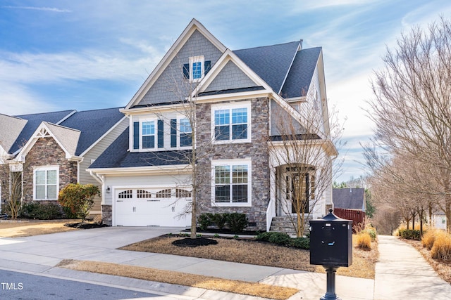 view of front of house featuring stone siding, concrete driveway, roof with shingles, and a garage