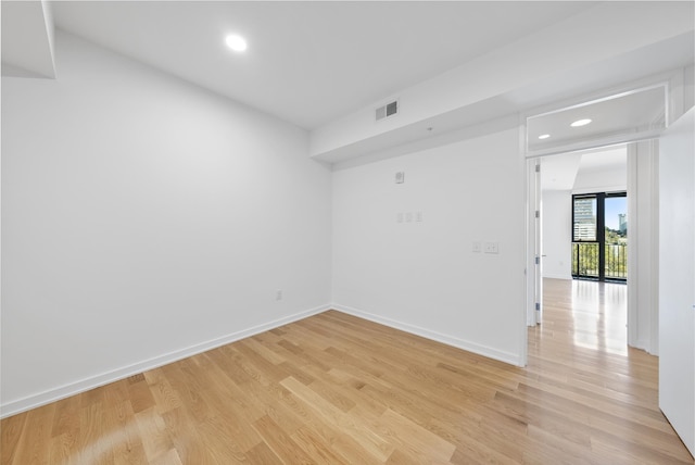 empty room with light wood-type flooring