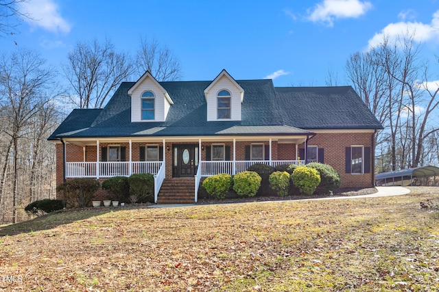 view of front of house featuring a front yard and a porch