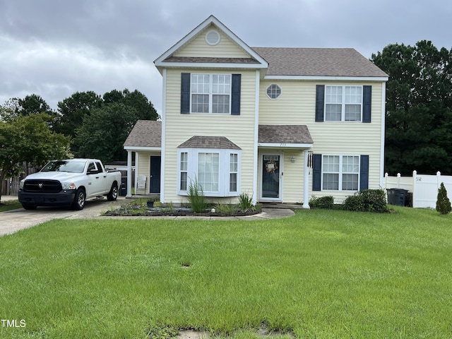 view of front facade featuring a front yard