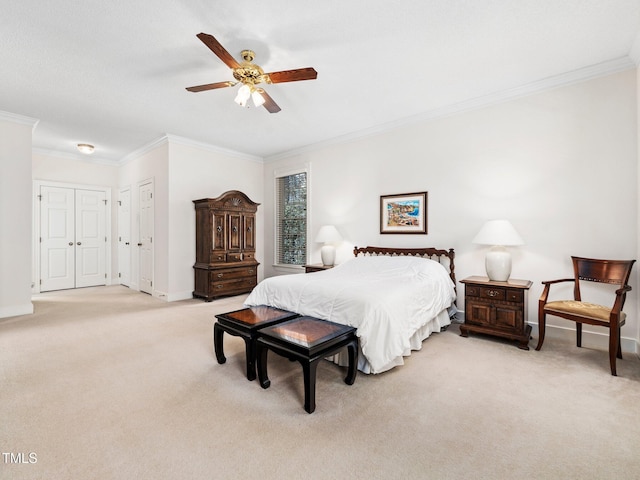 bedroom with ornamental molding, light colored carpet, baseboards, and a ceiling fan