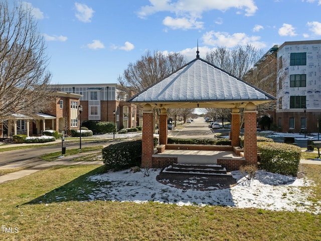 view of community featuring a lawn and a gazebo