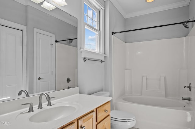 bathroom with a closet, toilet, ornamental molding, tub / shower combination, and vanity