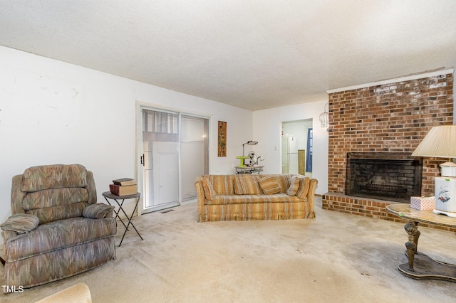 carpeted living room featuring a textured ceiling and a brick fireplace