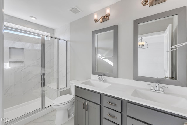 full bath featuring marble finish floor, visible vents, a sink, and a marble finish shower